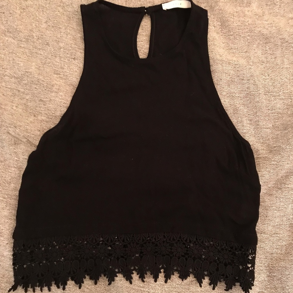 Lush black crop top with fringe bottom